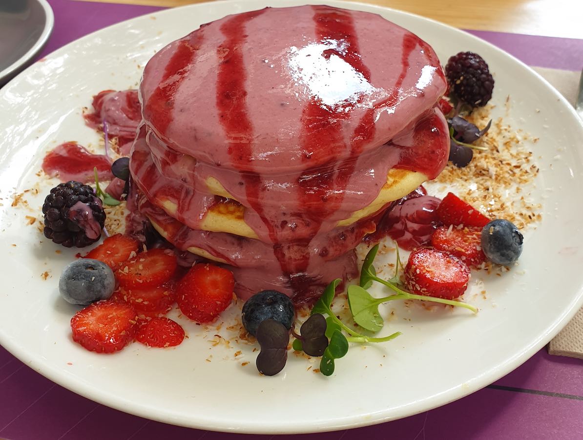 Lato pancakes covered in fruity sauce - a top pick on the MARVED vegetarian food guide to Barcelona.