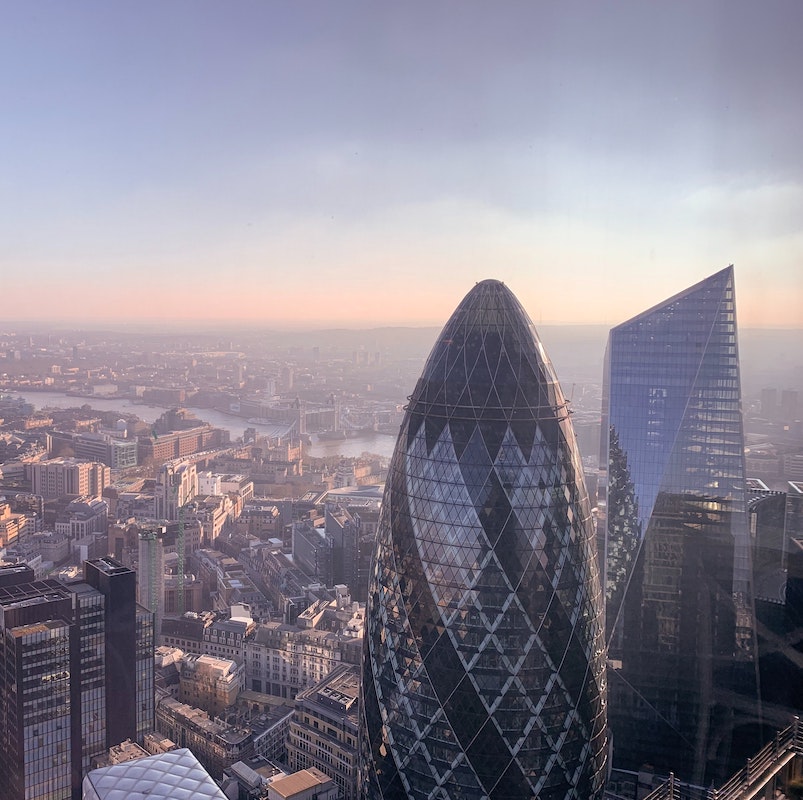 Wide shot of London including the gherkin building. Vegetarian food in London