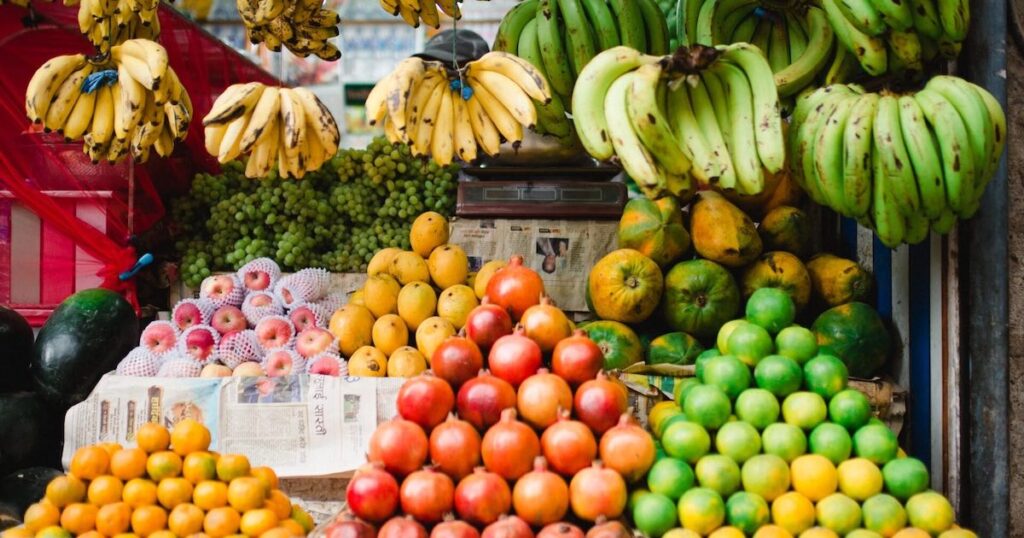 fruit stand with lots of fruit. Best vegetarian cookbooks