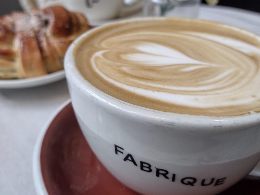 caradamon bun and coffee at Fabrique east london bakeries